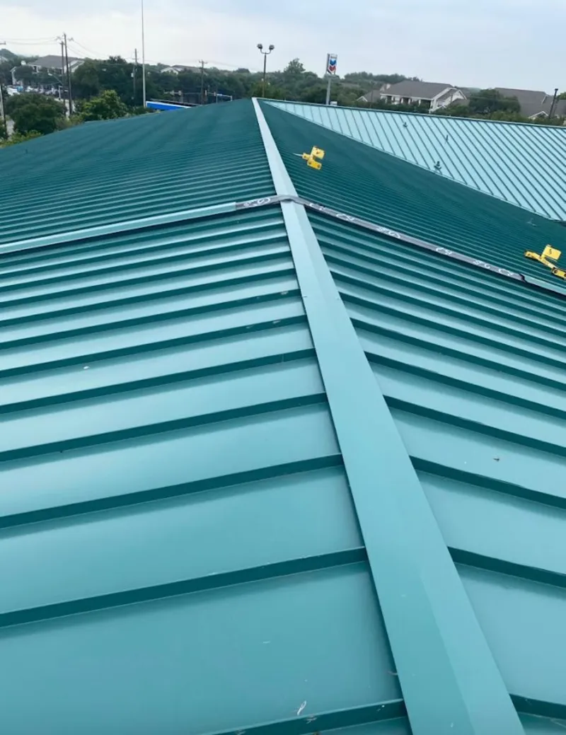 Green commercial metal roof ridge and valley for Metal Roof Repair in Ruidoso
